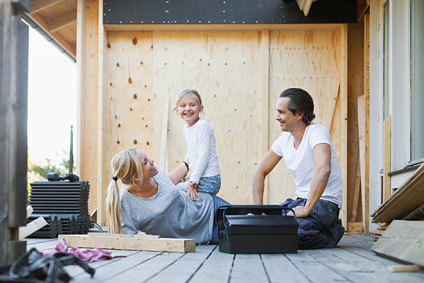 Famille qui profite de l'extension bois de sa maison